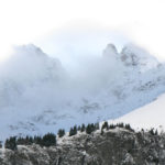 An extraordinary blue light through the clouds, Ecrins Massif